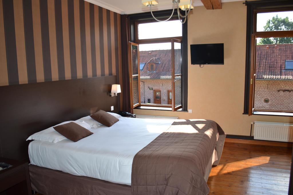 Hotel Le Domaine Des Cigognes Ennevelin Habitación foto