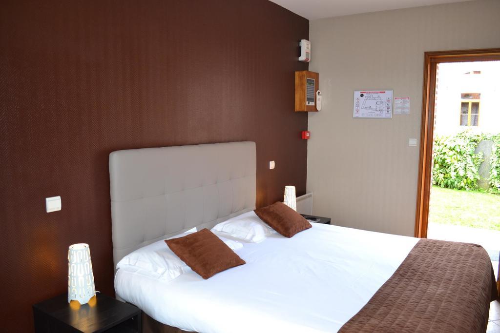 Hotel Le Domaine Des Cigognes Ennevelin Habitación foto