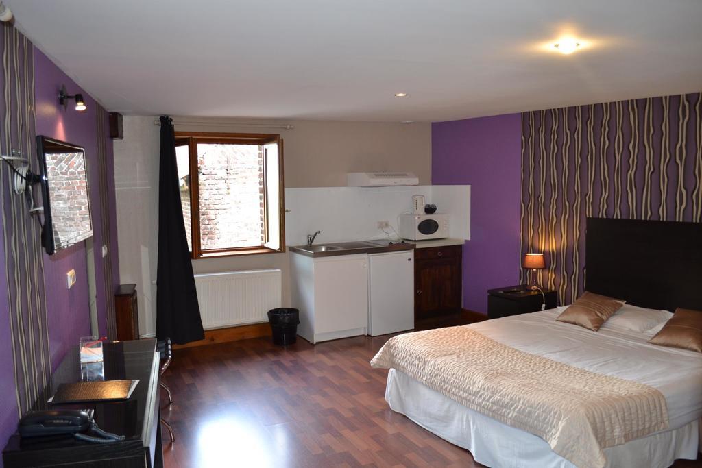 Hotel Le Domaine Des Cigognes Ennevelin Habitación foto