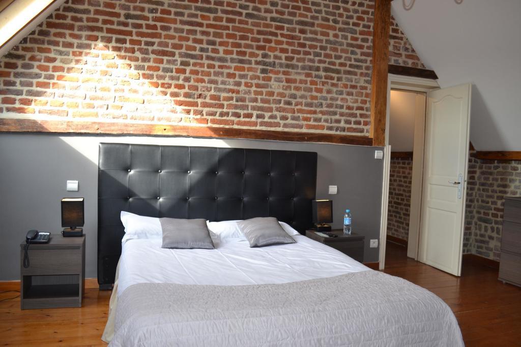 Hotel Le Domaine Des Cigognes Ennevelin Habitación foto