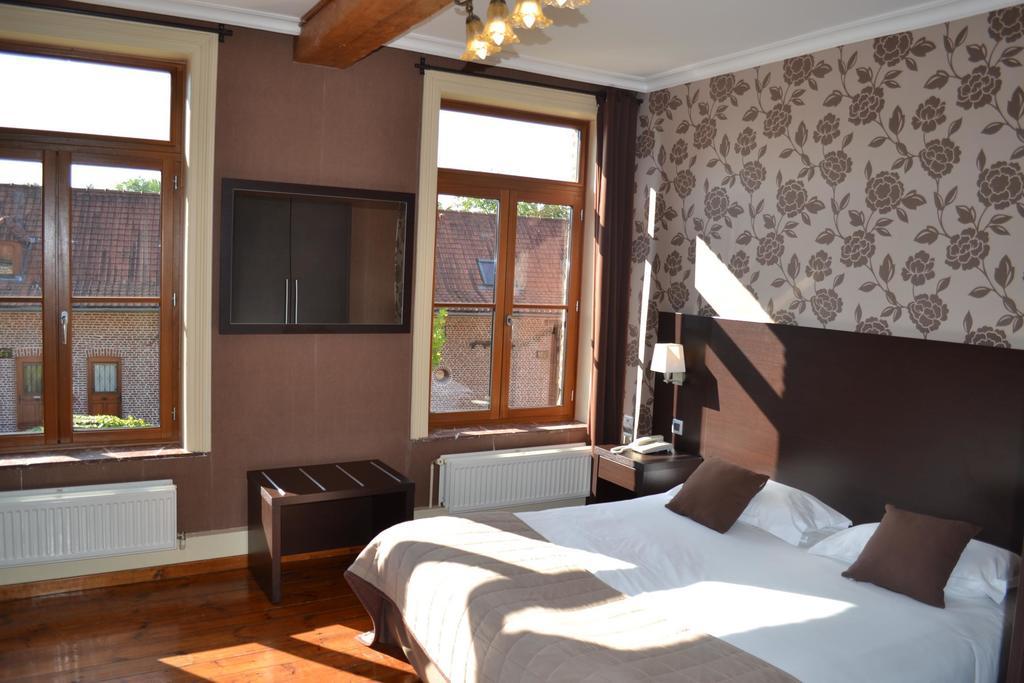 Hotel Le Domaine Des Cigognes Ennevelin Habitación foto